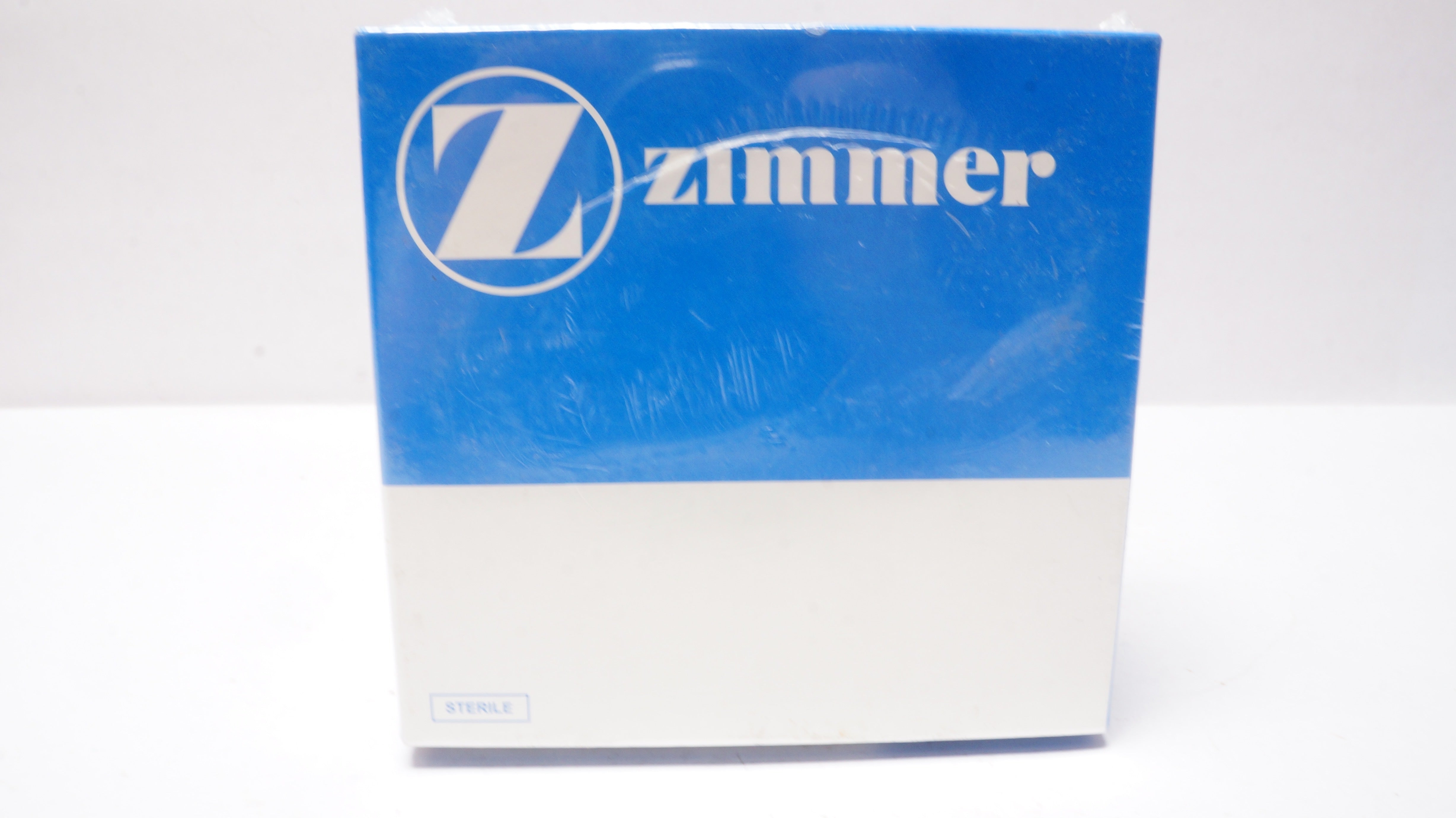 Zimmer 5994-50-23 NexGen Legacy (LCCK) Articular Surface w/Locking Screw Blue/G
