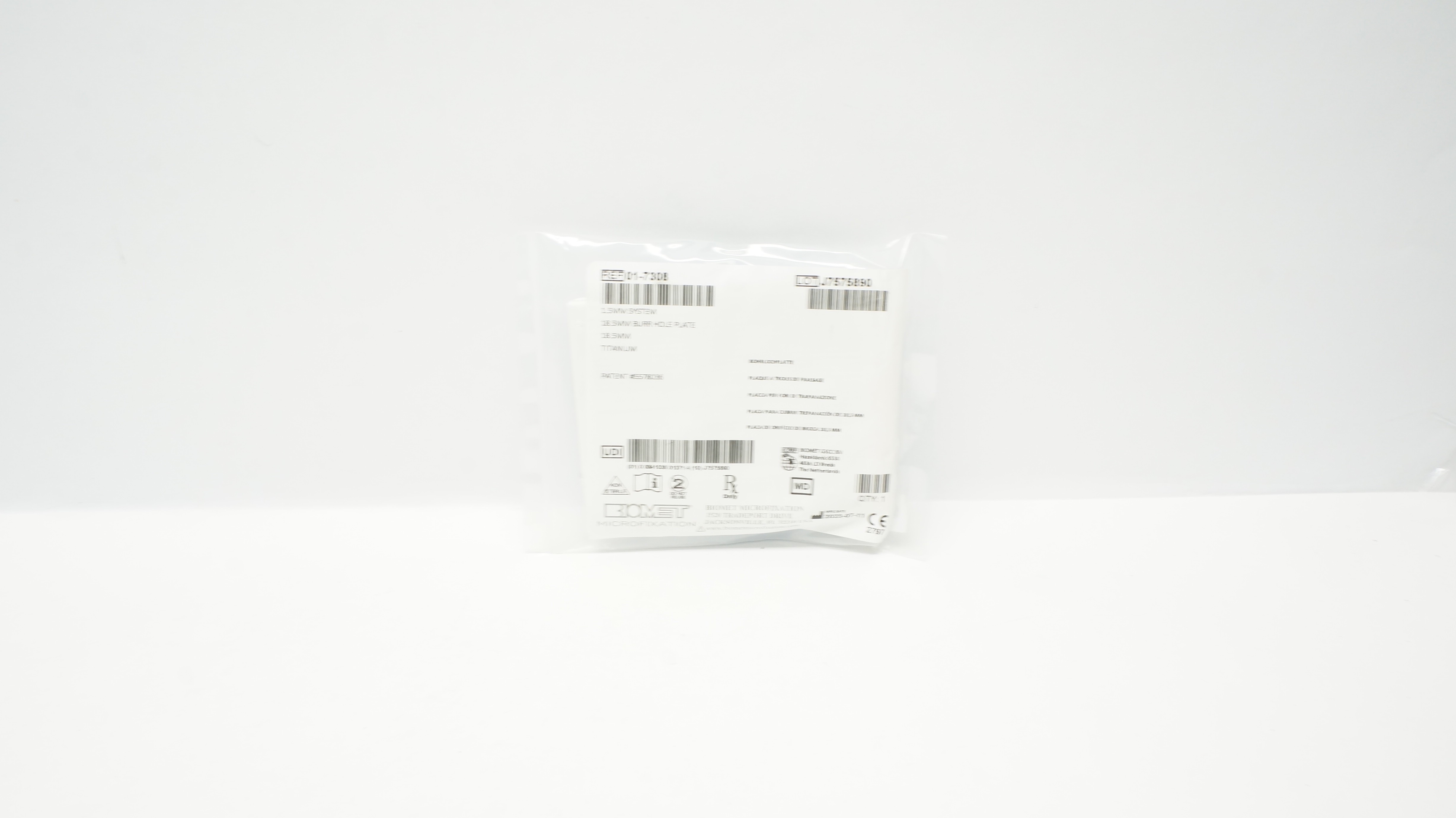 Biomet 01-7308 Burr Hole Plate Titanium 18.5mm x 1.5mm